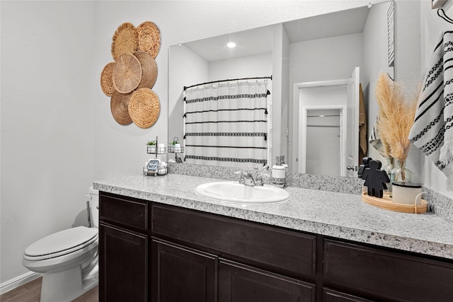 4629 Fringetree Way, Fort Worth, TX 76036 - full bathroom featuring wood finished floors, vanity, and toilet