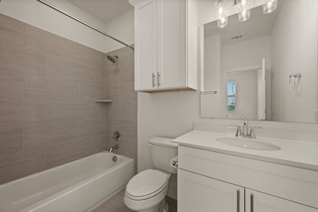 full bathroom with visible vents, toilet, vanity, and shower / washtub combination