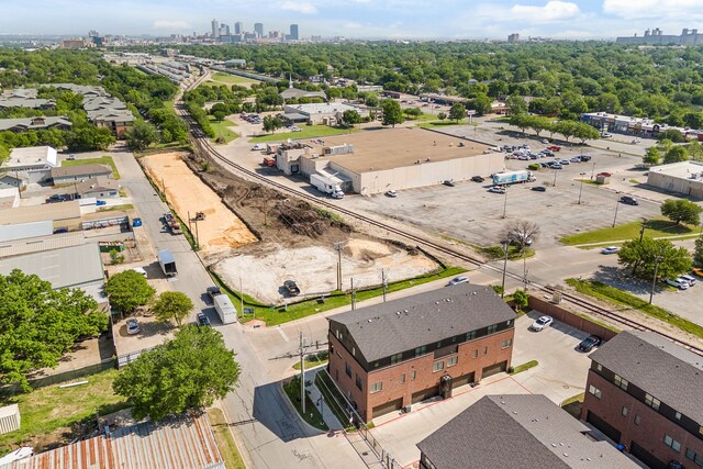 drone / aerial view featuring a city view