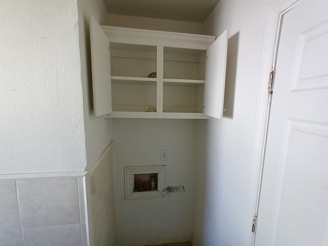 laundry area featuring hookup for a washing machine and laundry area