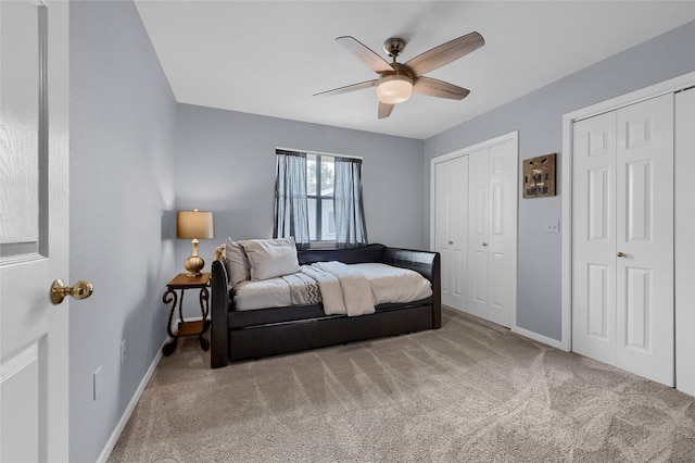 511 Kiowa Dr W, Lake Kiowa, TX 76240 - carpeted bedroom with multiple closets, baseboards, and a ceiling fan