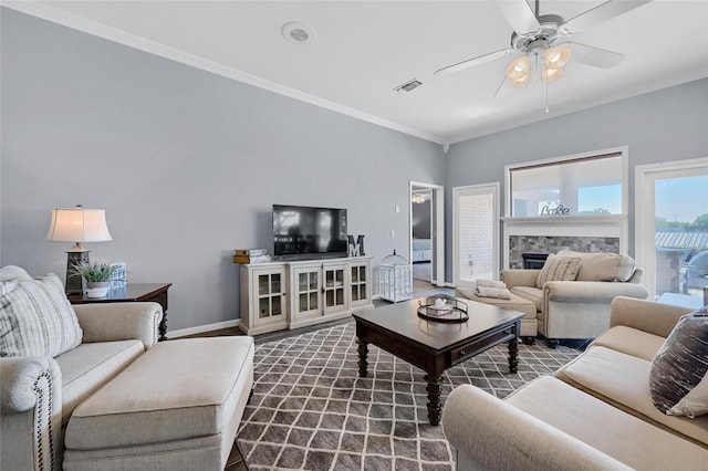 511 Kiowa Dr W, Lake Kiowa, TX 76240 - living area with wood finished floors, ceiling fan, a premium fireplace, baseboards, and ornamental molding