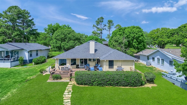 511 Kiowa Dr W, Lake Kiowa, TX 76240 - back of property featuring brick siding, a chimney, a yard, cooling unit, and roof with shingles