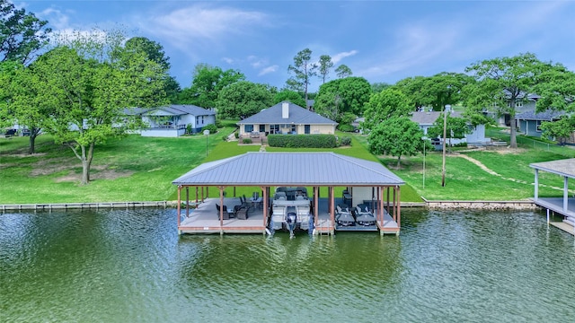 511 Kiowa Dr W, Lake Kiowa, TX 76240 - dock area featuring a lawn, boat lift, and a water view