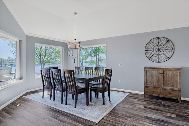 511 Kiowa Dr W, Lake Kiowa, TX 76240 - dining room featuring baseboards, an inviting chandelier, dark wood-type flooring, and ornamental molding