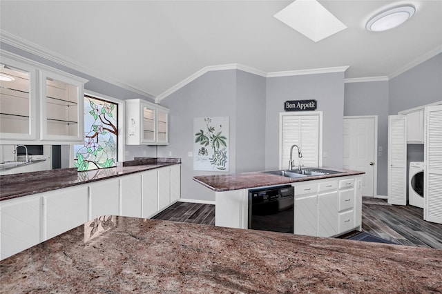 511 Kiowa Dr W, Lake Kiowa, TX 76240 - kitchen featuring dishwasher, washer / dryer, dark wood-type flooring, and a sink
