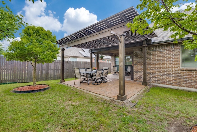 view of yard with a fenced backyard, a pergola, and a patio