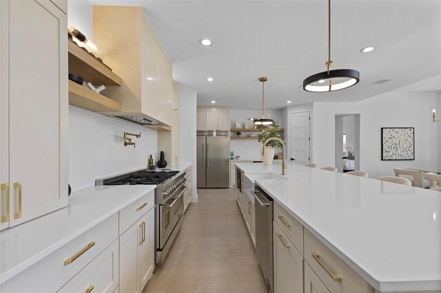1750 Greenwood Ct, Prosper, TX 75078 - kitchen featuring open shelves, a sink, high end appliances, and recessed lighting