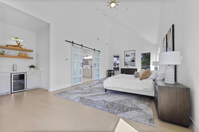 1750 Greenwood Ct, Prosper, TX 75078 - bedroom with a barn door, ensuite bathroom, baseboards, high vaulted ceiling, and beverage cooler