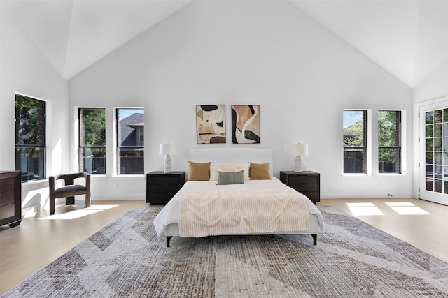 1750 Greenwood Ct, Prosper, TX 75078 - bedroom featuring high vaulted ceiling and wood finished floors