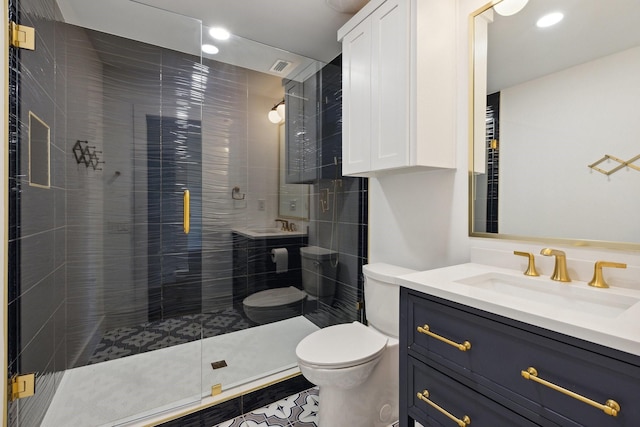 full bathroom featuring recessed lighting, a shower stall, visible vents, toilet, and vanity