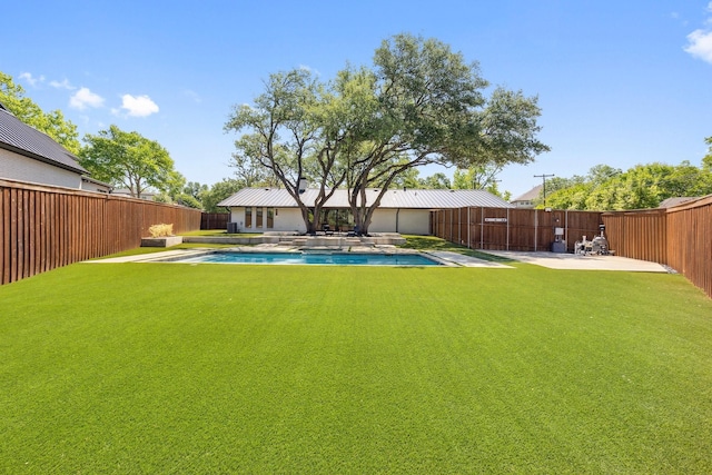 view of yard with a fenced backyard, a patio area, and a fenced in pool