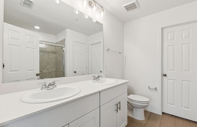 7200 Pederson Creek Way, Denton, TX 76208 - full bath with double vanity, a shower stall, and toilet