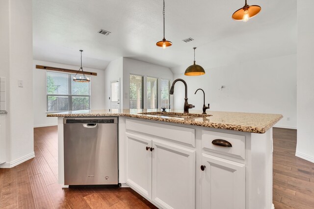 kitchen featuring dark wood-type flooring, visible vents, dishwasher, and a sink