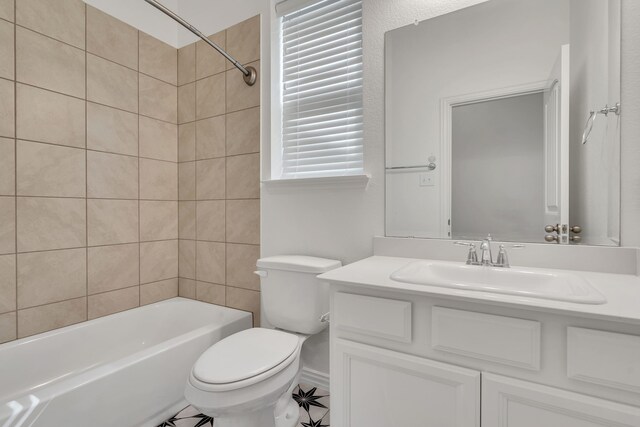 bathroom with toilet, bathtub / shower combination, and vanity