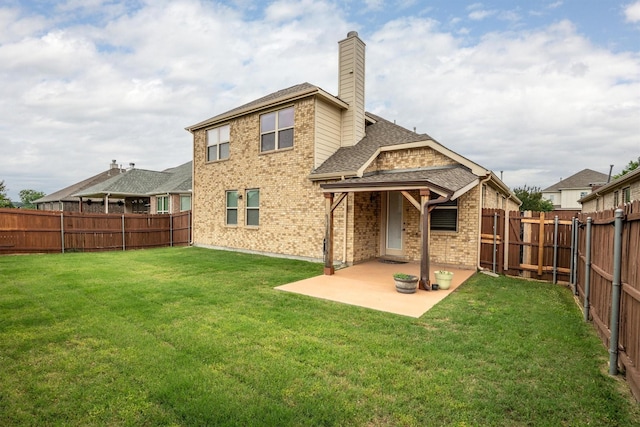 4717 Whitehall Ct, Mckinney, TX 75070 - back of house featuring a shingled roof, a patio, a chimney, and brick siding