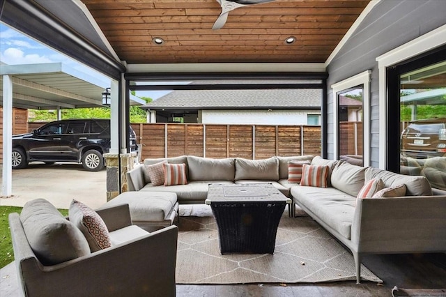 view of patio / terrace featuring fence and outdoor lounge area