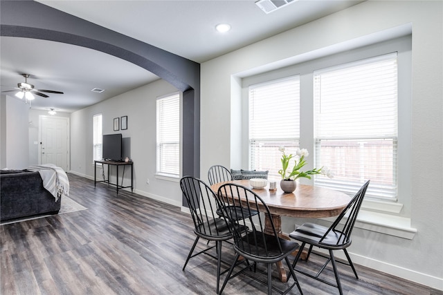 3504 Periwinkle Dr, Aubrey, TX 76227 - dining room with baseboards, dark wood-style floors, arched walkways, a ceiling fan, and recessed lighting