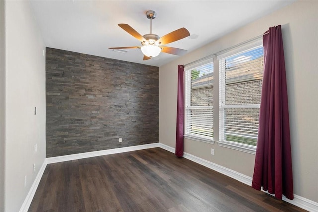 6514 Eagle Rock Dr, Frisco, TX 75036 - unfurnished room with baseboards, a ceiling fan, and wood finished floors