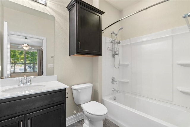 6514 Eagle Rock Dr, Frisco, TX 75036 - full bathroom with toilet, shower / bathing tub combination, baseboards, tile patterned flooring, and vanity