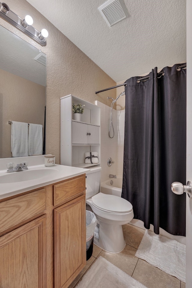 6121 Bowfin Dr, Fort Worth, TX 76179 - bathroom with a textured wall, vanity, a textured ceiling, and visible vents
