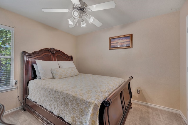 6121 Bowfin Dr, Fort Worth, TX 76179 - bedroom featuring baseboards, light colored carpet, and ceiling fan