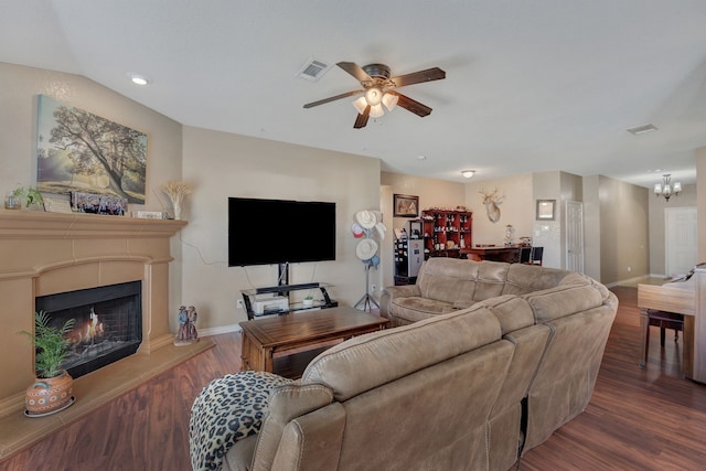 6121 Bowfin Dr, Fort Worth, TX 76179 - living area featuring baseboards, wood finished floors, visible vents, and ceiling fan with notable chandelier