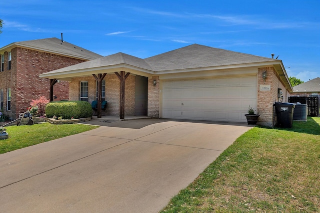 6121 Bowfin Dr, Fort Worth, TX 76179 - ranch-style home featuring concrete driveway, a front lawn, covered porch, a garage, and brick siding