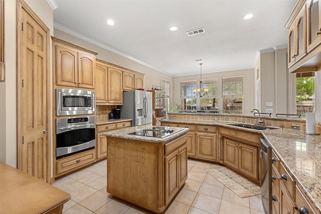 kitchen featuring visible vents, light tile patterned floors, a sink, decorative backsplash, and appliances with stainless steel finishes