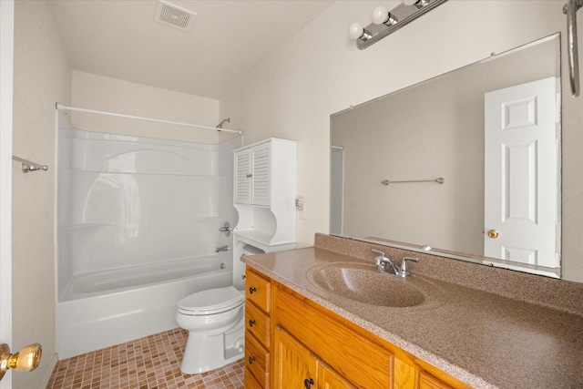 bathroom featuring vanity, tub / shower combination, toilet, tile patterned flooring, and visible vents