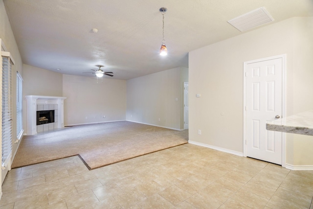 803 Sterling Ct, Allen, TX 75002 - unfurnished living room featuring light carpet, ceiling fan, baseboards, and a fireplace