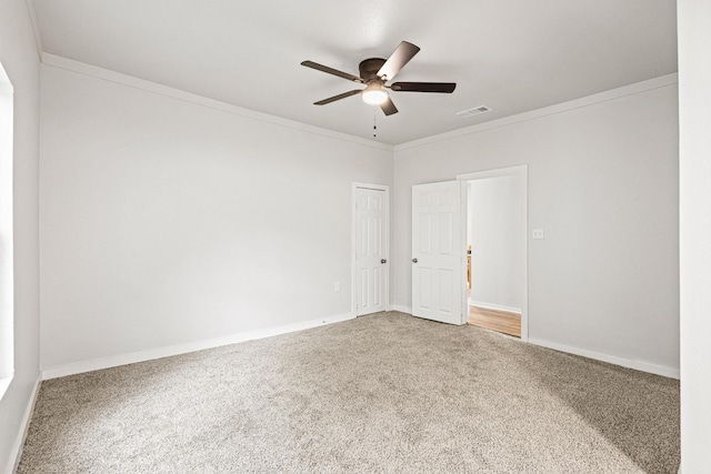 1031 W Chestnut St, Denison, TX 75020 - unfurnished room with carpet floors, ceiling fan, baseboards, and crown molding