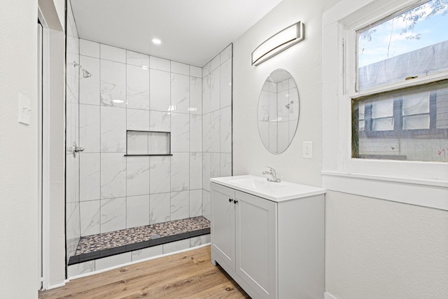 1031 W Chestnut St, Denison, TX 75020 - full bath with a walk in shower, vanity, wood finished floors, and recessed lighting