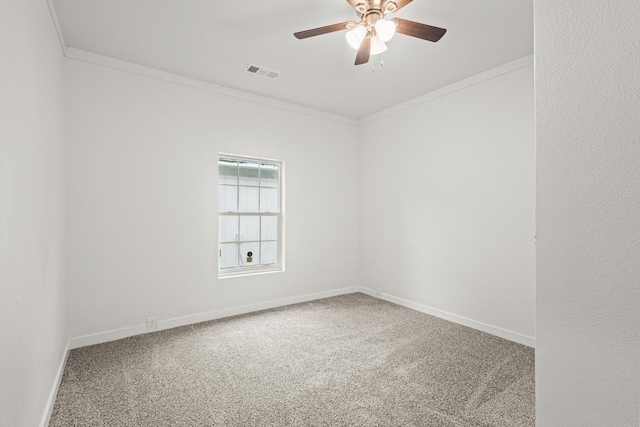 1031 W Chestnut St, Denison, TX 75020 - carpeted spare room featuring a ceiling fan, crown molding, and baseboards
