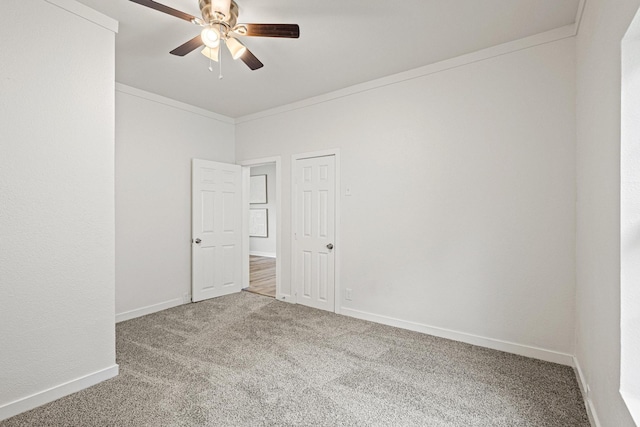 1031 W Chestnut St, Denison, TX 75020 - carpeted spare room featuring a ceiling fan, baseboards, and ornamental molding