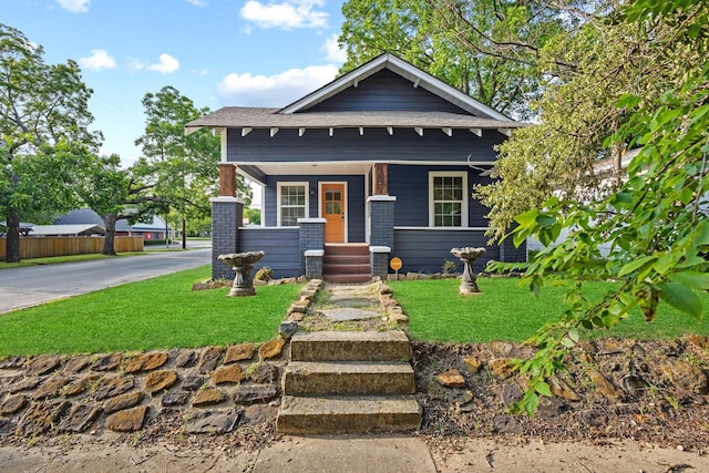 1031 W Chestnut St, Denison, TX 75020 - view of front of home featuring a porch