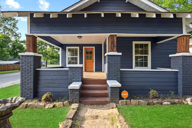 1031 W Chestnut St, Denison, TX 75020 - shotgun-style home featuring covered porch