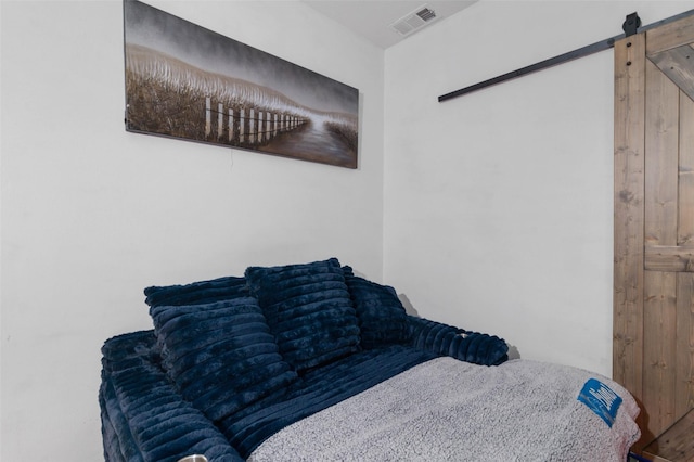 3023 Wind Knot Way, Royse City, TX 75189 - bedroom featuring a barn door