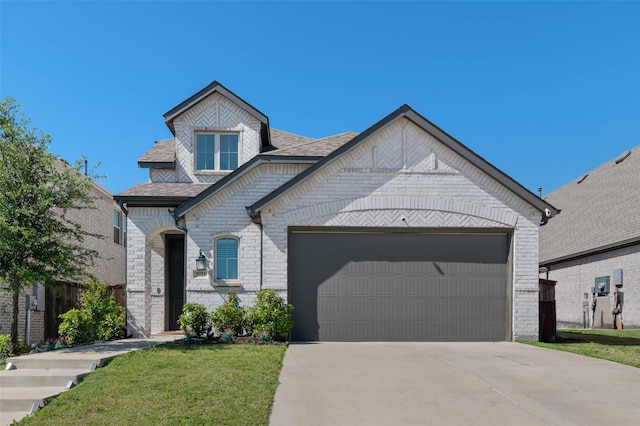 3023 Wind Knot Way, Royse City, TX 75189 - french country style house with an attached garage, driveway, roof with shingles, a front lawn, and brick siding