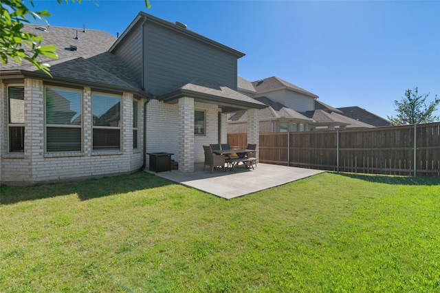 3023 Wind Knot Way, Royse City, TX 75189 - rear view of house with brick siding, a patio area, and roof with shingles