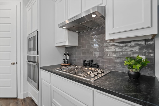 3023 Wind Knot Way, Royse City, TX 75189 - kitchen with extractor fan, stainless steel appliances, white cabinets, tasteful backsplash, and dark wood-type flooring