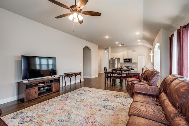 1400 Stone Ridge Dr, Anna, TX 75409 - living area with lofted ceiling, a ceiling fan, arched walkways, and dark wood-type flooring