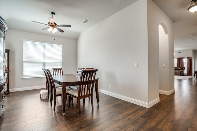 1400 Stone Ridge Dr, Anna, TX 75409 - dining space with arched walkways, baseboards, visible vents, ceiling fan, and dark wood-type flooring