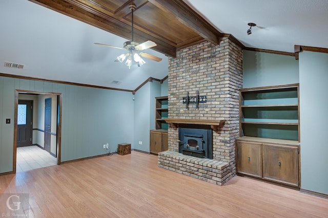 unfurnished living room with ceiling fan, ornamental molding, wood finished floors, and visible vents