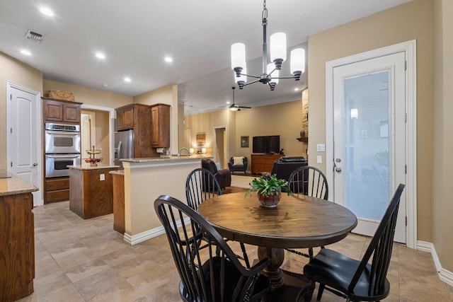 1027 Addison Ave, Pottsboro, TX 75076 - dining space with a chandelier, recessed lighting, baseboards, and ceiling fan
