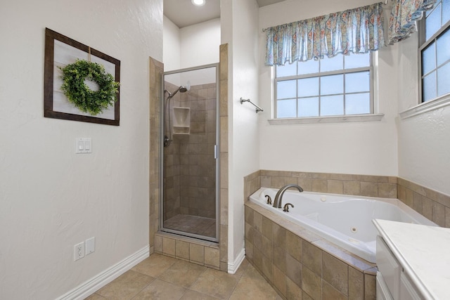 1027 Addison Ave, Pottsboro, TX 75076 - full bathroom with a stall shower, a jetted tub, tile patterned flooring, baseboards, and vanity