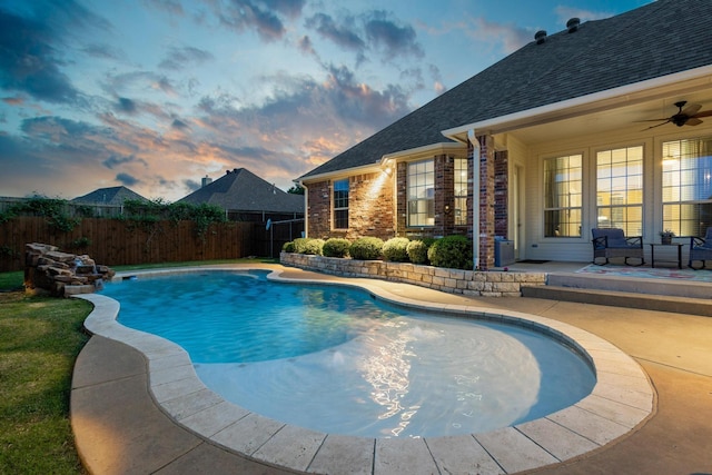 1027 Addison Ave, Pottsboro, TX 75076 - pool at dusk with a fenced backyard, a patio area, and ceiling fan
