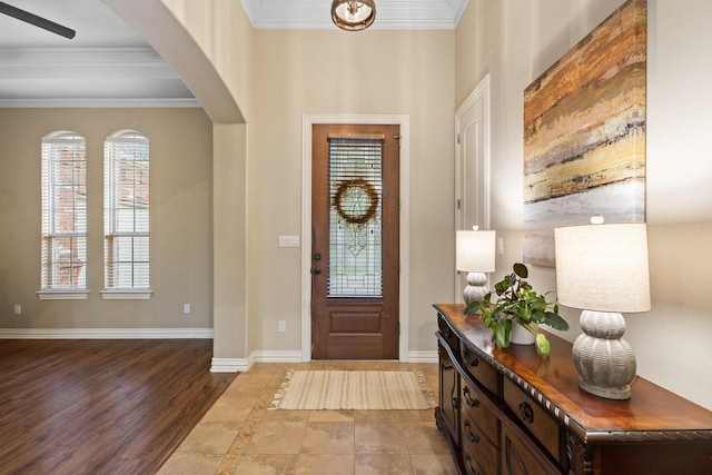 1027 Addison Ave, Pottsboro, TX 75076 - entryway featuring plenty of natural light, crown molding, arched walkways, and baseboards