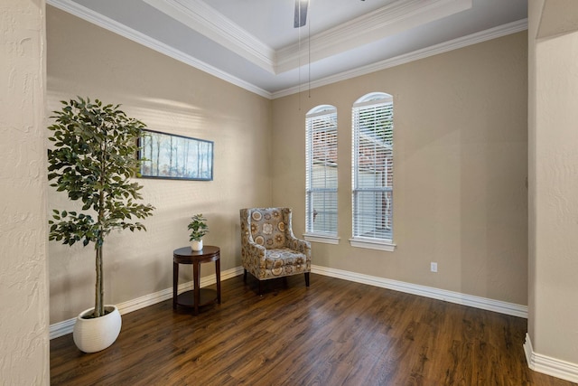 1027 Addison Ave, Pottsboro, TX 75076 - living area with dark wood-style flooring, a raised ceiling, baseboards, ceiling fan, and ornamental molding