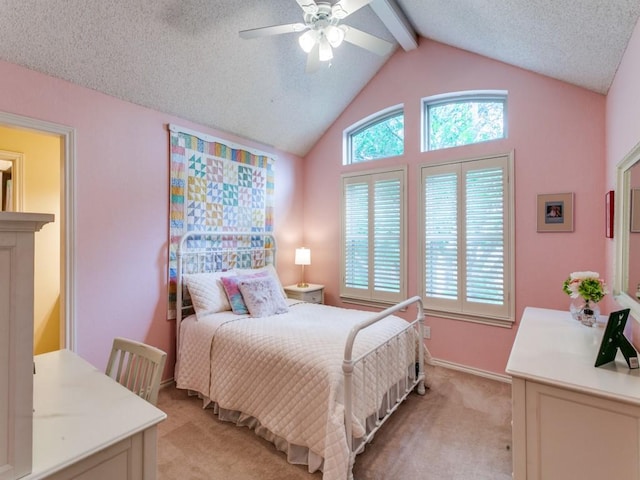 bedroom featuring a ceiling fan, baseboards, light colored carpet, and vaulted ceiling with beams